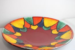 A delphis harlequin large Poole charger (diameter 39.5cm)