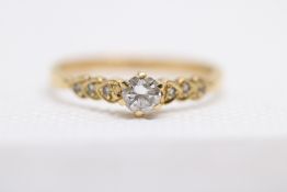 18ct Gold ring set with solitaire diamond, diamond