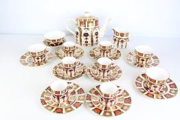 Royal Crown Derby English bone china part tea and coffee service in an Imari palette, including a