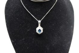 14ct White gold pendant set with baguette diamonds