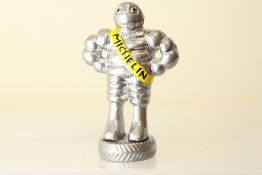 Small chrome Michelin Man