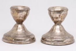 Pair of silver dwarf candle sticks Total weight 20