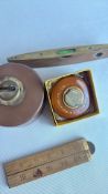 Group of Vintage Measuring Tools Including Spirit Level and Tape Measures