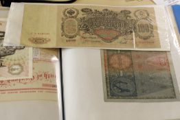 An album containing early world bank notes