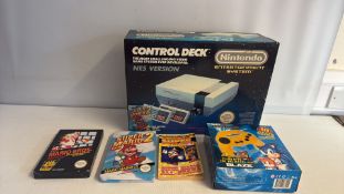 Group of Nintendo NES Control Deck box and assorted Mario and plug-and-play gaming items