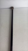 Gentleman’s walking cane with engraved silver pommel