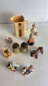 A group of ceramic and pottery decorative items including a White Mackay Scotch Whisky jug and