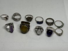 11 Silver rings Total weight 57g