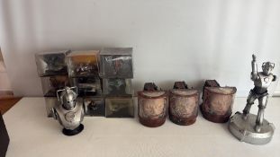 A group of science-fiction models and Cyberman figures