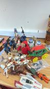 Group of mixed toys including stagecoach, cowboy and Indian figures, E.T. and Star Wars models