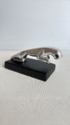 A Modern Metal Leaping jaguar Sculpture on Plinth