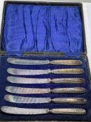 Set of 6 silver butter knives in plush fitted case