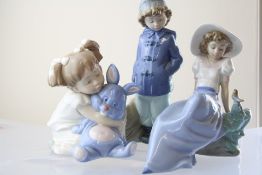 Nao' porcelain figure group of children and rabbit