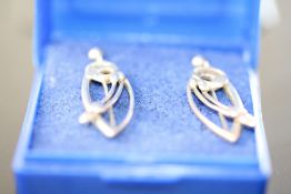 Boxed pair of Macintosh earrings