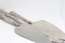 3 Cake slices 1 with silver handle