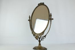 Gilt metal oval dressing table mirror