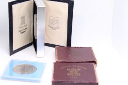 4 Cased commemorative coins