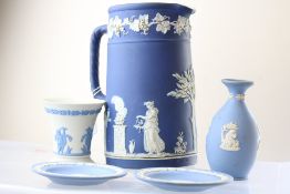 A group of Wedgwood-style blue jasperware and dipped ceramic tablewares