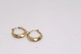 Pair of 9ct gold earrings 1.3g