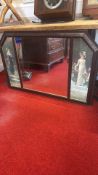 Victorian-style mahogany mirror with figural side panels