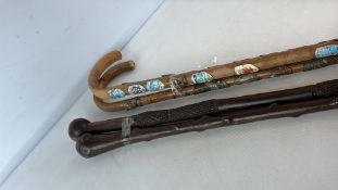 2 Decorated Wooden Walking Canes