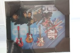 Oasis framed mini guitars