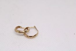 Pair of 9ct gold earrings A.F