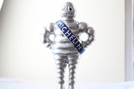 Large chrome standing Michelin man