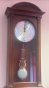 Mahogany longcase-style wall clock