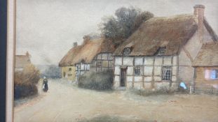 Signed watercolour of thatched cottages (32cm x 40cm inc frame)