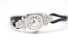 Ladies Platinum And Diamonds Cocktail watch in JW