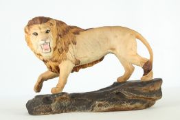 Beswick lion on rock