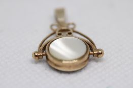 9ct Gold twizzle fob/pendant set with mother of pe