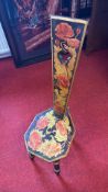 Painted wooden pedestal stand with poppy decoration