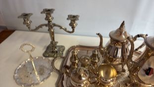 Group of ornate silver-plated tea service, candelabrum and cake stand