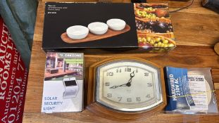 A group of assorted household items including Smiths wall clock, Goodmans DAB radio, John Lewis