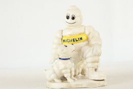 Cast iron Michelin man & dog