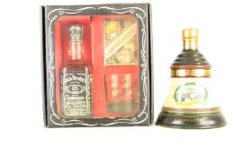 2 whisky gift items: boxed Jack Daniel’s Old No.7 set and Bell’s Christmas 1990 decanter
