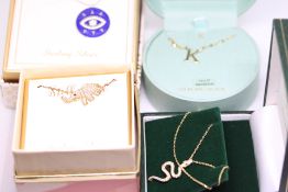 4 Silver chains & pendants