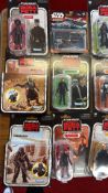 A group of Star Wars Kenner â€œThe Book of Boba Fettâ carded figures and Star Wars Micro Machines