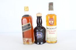 A group of vintage Scotch whisky bottles