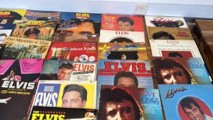 A group of Elvis Presley vinyl records