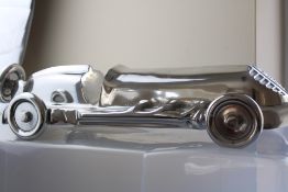 Large chrome racing car