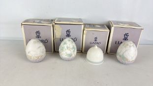 Lladro porcelain Easter egg ornaments and bell, circa 1995
