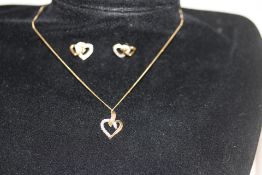 9ct Gold chain & heart shaped pendant together wit