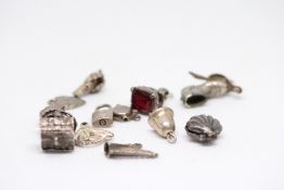 12 Silver charms Weight 32g