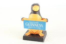 Cast iron Guinness penguin