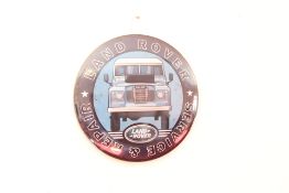 Large metal land rover sign