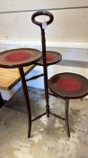 Mahogany three-tier cake stand with red baize insets