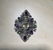 Edwardian silver brooch with Suffragette coloured gem stones